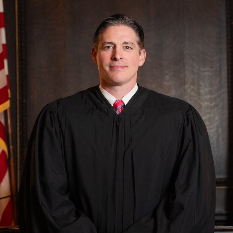 Photo of Judge Brandon Neuman